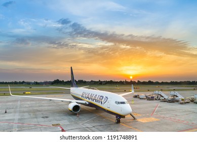 Bologna Guglielmo Marconi Intl' Airport, Italy - May 26, 2016: A Ryanair Boeing 737-800 airplane parked at sunset
