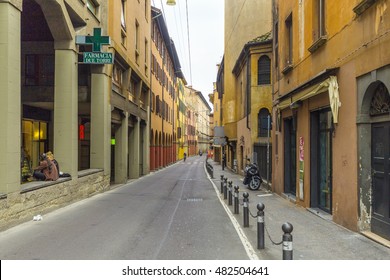 BOLOGNA, ITALY - 4 MAY, 2015: Old street in the downtown. Bologna is home to numerous prestigious cultural, economic and political institutions.