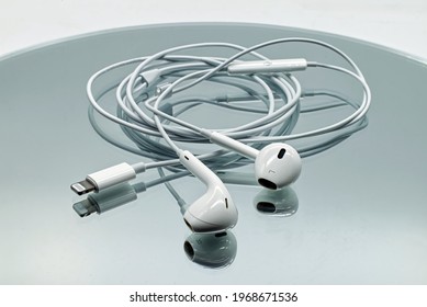 Bologna - Italy - April 27, 2021: Apple Ear Pods With Lightning Connector Developed By Apple Inc.