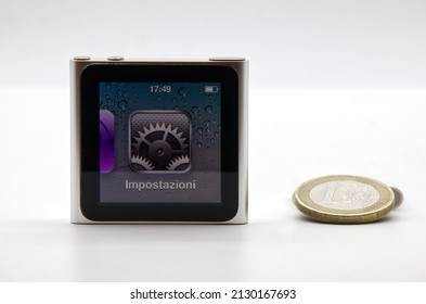 Bologna - Italy - February 27, 2022: Apple Ipod Nano Size Comparison With One Euro Coin. Vintage Technology