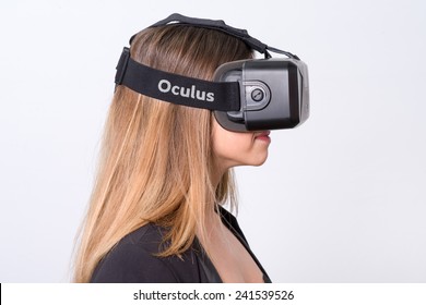 Bologna, ITALY - Jan 4, 2015: A woman wearing Oculus Rift. Rift is a wearable computer with an optical head-mounted display that is being developed by Oculus