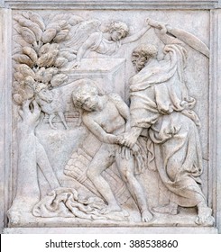 BOLOGNA, ITALY - JUNE 04: Abraham Sacrificing Isaac, relief on portal of Saint Petronius Basilica in Bologna, Italy, on June 04, 2015