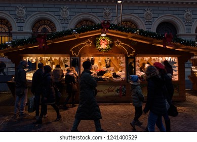 Bologna / Italy, - November 24 2018: People Shopping In Christmas Market In Bologna, Italy