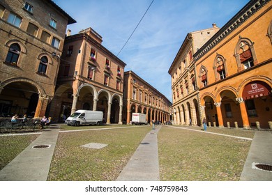 BOLOGNA, ITALY - October, 2017: Old Street View Bologna City, Italy. Cobble Stone Street With Bollards. Renaissance Buildings