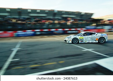 BOLOGNA,ITALY-06 DECEMBER: panned shots of   a ferrari f430 drived by Giuseppe Fascicolo , Ferrari Challenge Shell Cup at the 2008 edition of Motor Show in Bologna,Italy - Shutterstock ID 24087613