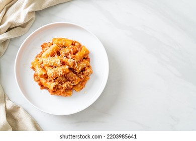 Bolognese rigatoni pasta with cheese - traditional Italian pasta - Shutterstock ID 2203985641