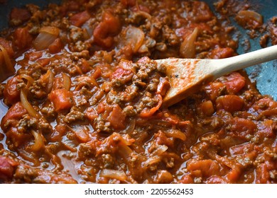 Bolognese Sauce In A Saucepan.  Spaghetti Bolognese Cooking Preparation Concept. Traditional Italian Food.