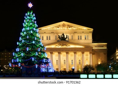 Bolshoi Theatre (Large, Great Or Grand Theatre, Also Spelled Bolshoy) And Christmas Tree At Night, Moscow, Russia