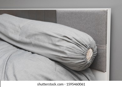 Bolster On Bed In Bedroom