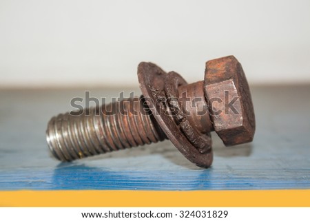 Bolt old Gail's nest with rust and grease, Through the use of bolts that , Background of industrial.