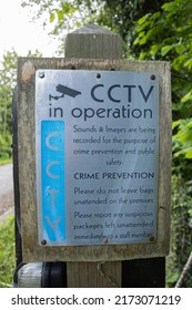 Bolton Abbey Station, North Yorkshire, UK 21 May 2022: CCTV in operation and crime prevention sign at Bolton Abbey railway station, Yorkshire, UK