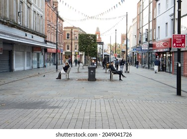 BOLTON, UK -SEPTEMBER 28, 2021:  A pedestrianised street in the centre of Bolton, Lancashire