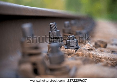 bolts for fastening rails to sleepers covered by oil