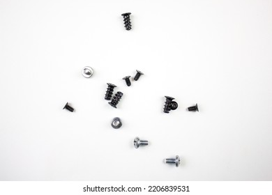 The bolts   screws Metal screws  bolts for tightening white background 