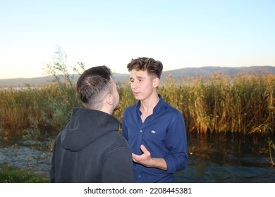 Bolu, Turkey - September 25 2022 : Fight. Two Young Men Fighting By The Lake.