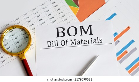 BOM - Bill Of Materials text with magnifying glass lens on office desk table. - Shutterstock ID 2179099521