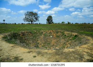 Bomb Crater In Phonshavan, Laos.