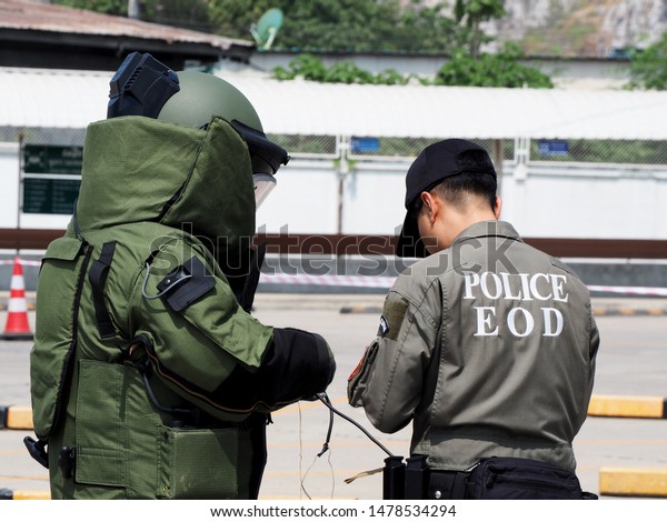 Bomb Disposal Expert in Bomb suit for Explosive
ordnance disposal