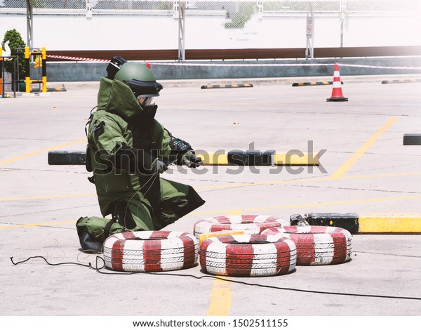 Bomb Disposal Expert in Bomb suit for Explosive
ordnance disposal