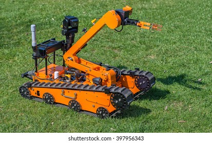 Bomb disposal robot ready for missions, in standby on grass