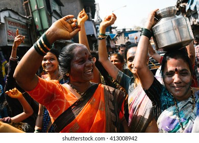 Bombay, India - March 12 2015: Indian Crowd Dancing In The Street During Holi Festival - Mar, 12, 2015 At Bombay, India