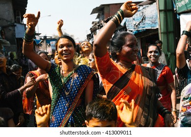 Bombay, India - March 12 2015: Indian Crowd Dancing In The Street During Holi Festival - Mar, 12, 2015 At Bombay, India