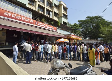 Bombay, India - November 12, 2016: People Standing In Long Queue To Withdraw Money From Banks After Demonetization Of Rs.500 And Rs.1000 Indian Currency Notes
