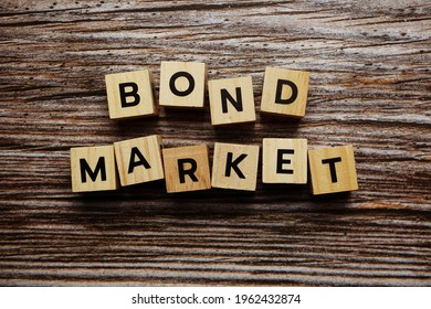 Bond Market Alphabet Letter On Wooden Background