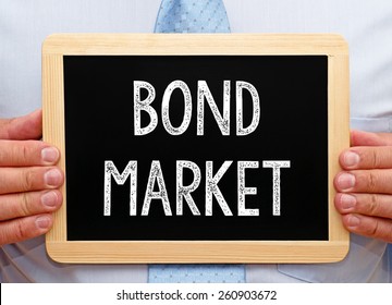 Bond Market - Businessman With Chalkboard