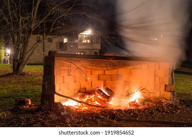 bondfire in a cinderblock enclosure