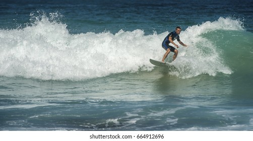 BONDI BEACH, AUSTRALIA - FEBRUARY 26, 2016: Surfing at Bondi Beach.  Bondi Beach is a popular beach and the name of the surrounding suburb in Sydney, New South Wales, Australia