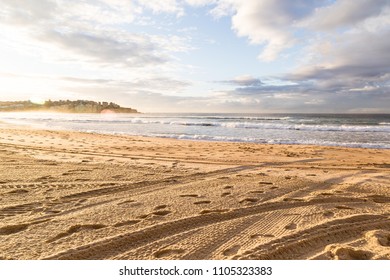 Bondi Beach At Dawn Sunrise With Sun Flare