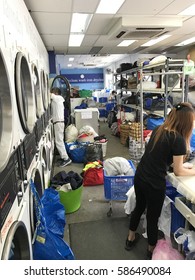 Bondi Dry Clean's Shop,At Bondi Beach Sydney Australia.On Weekend 18th February 2017:To Many Customers Drop Off A Lot Of Laundry.The Staff Was Working Very Hard,shop Look Messy And Unclean, Is Normal.