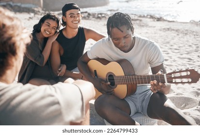 Bonding people, playing or guitar by beach, ocean or sea in holiday vacation, summer travel or social gathering. Smile, happy and couple of friends with musical instrument in relax diversity picnic - Powered by Shutterstock