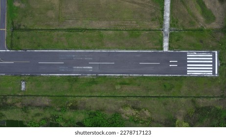 BONE, INDONESIA - JULY 07 th, 2021 - airport runway view