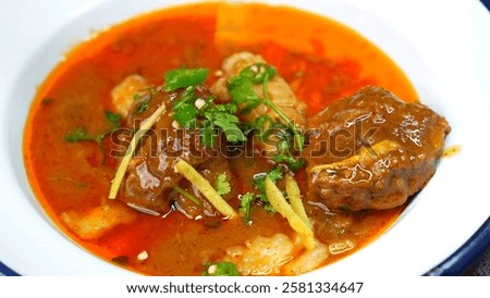Bone marrow curry - Mutton Curry - Nalli Nihari is a slow cooked delicacy made from fresh goat, lamb, sheep or beef meat. This Indian dish is popular worldwide and top choice of meat lovers