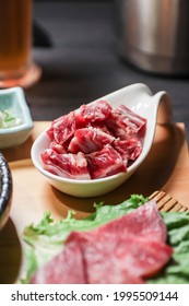 Boneless Beef Short Ribs In A White Bowl