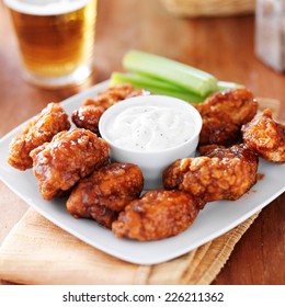 Boneless Buffalo Bbq Chicken Wngs With Ranch Sauce And Beer