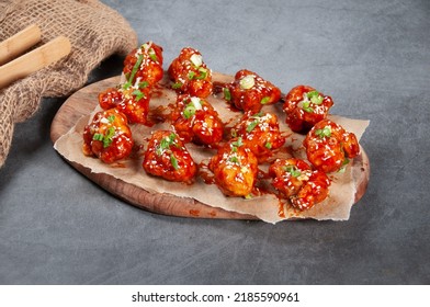 Boneless Chicken Wings Bites 12 Piece Isolated On Wooden Board On Grey Background Side View Of Fastfood