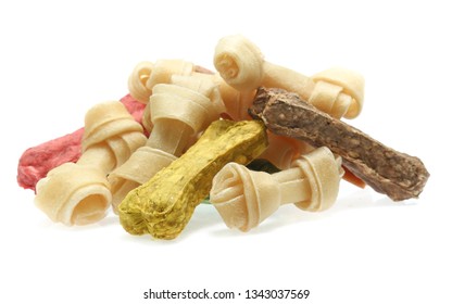 Bones And Colorful Sticks For Dog Treat With Vitamin And Oral Health On White Background