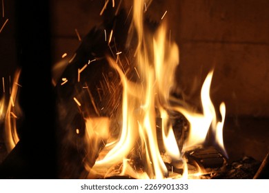 A bonfire warming up the night - Shutterstock ID 2269901333
