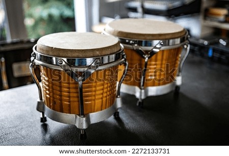 Bongos drums in recording studio for hard beat perfomance. Professional musical instrument for rock and pop show