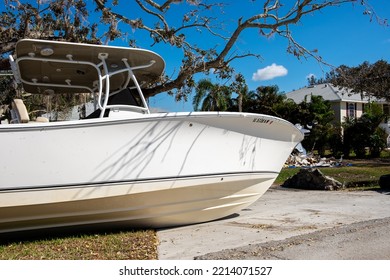 Bonita Springs, Florida - October 6, 2022: A Boat That Was Washed Up Into A Residential Neighborhood During Hurricane Ian