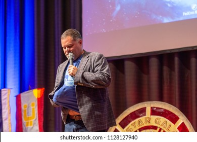 BONN, GERMANY - MAY 19th 2018: Aaron Douglas (*1971, Canadian Actor, Battlestar Galactica) Talks About His Experiences In Battlestar Galactica At Fedcon 27, A Four Day Sci-fi Fan Convention