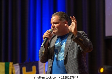 BONN, GERMANY - MAY 19th 2018: Aaron Douglas (*1971, Canadian Actor, Battlestar Galactica) Talks About His Experiences In Battlestar Galactica At Fedcon 27, A Four Day Sci-fi Fan Convention