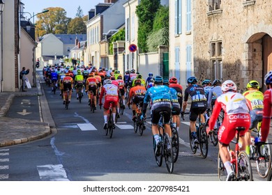 Bonneval, France - October 10, 2021: Rear View Of The Peloton Riding In Bonneval During Road Cycling Race Paris-Tour 2021.