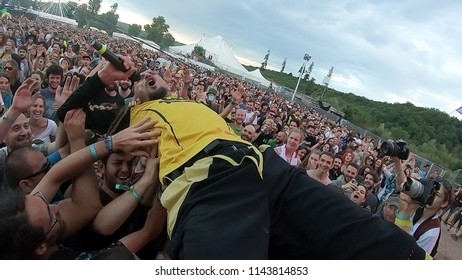 BONTIDA, ROMANIA - JULY 22, 2018: Singer Of Dubioza Kolektiv Band Doing A Crowd Surfing During Their Concert At Electric Castle Festival