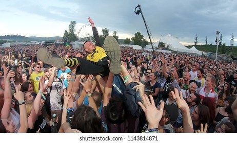 BONTIDA, ROMANIA - JULY 22, 2018: Singer Of Dubioza Kolektiv Band Doing A Crowd Surfing During Their Concert At Electric Castle Festival