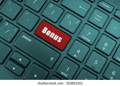 Bonus button on laptop computer keyboard