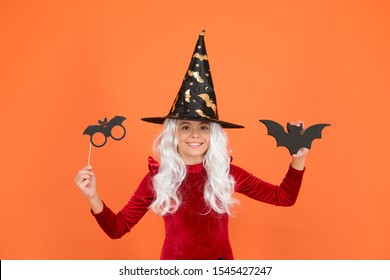 Boo To You. Little Wicked Witch Orange Background. Small Child Wear Witch Costume For Holiday Celebration. Halloween Celebration. Photobooth For Holiday Celebration. All Saints Day Celebration.